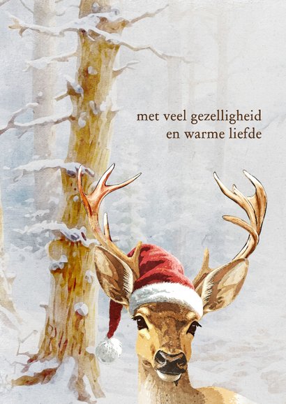 Kerstkaart hert in een besneeuwd bos 2