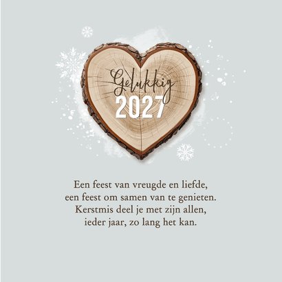 Kerstkaart sneeuwvlokken houten hart boomstam winter 3