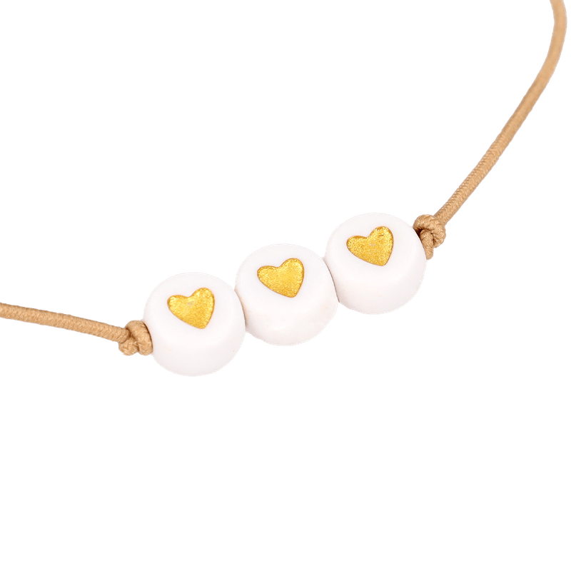 Armbandje ‘Hartjes’ (wit/goud)