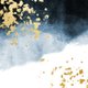 Blauwe waterverf met gouden spetters