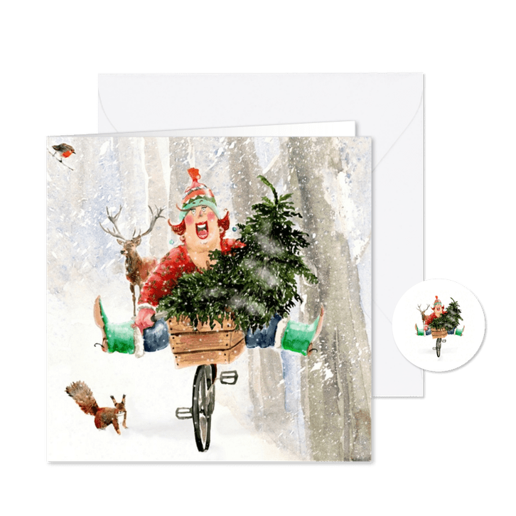 Kerstkaart Met de boom op de fiets