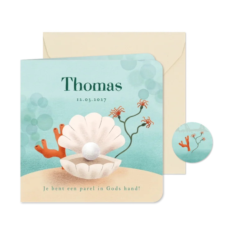 Christelijk geboortekaartje met parel in schelp