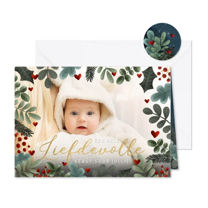 Foto kerstkaart met kersttakjes kader en liefdevolle kerst