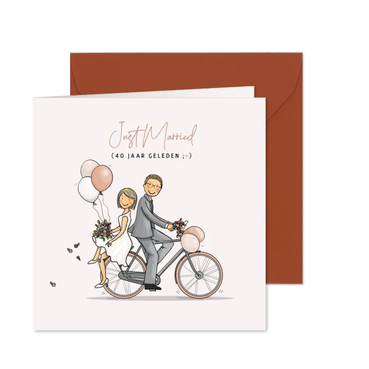 Jubileumkaart op fiets met ballonnen