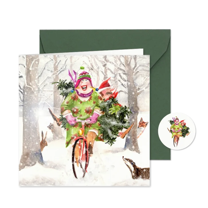 Kerstkaart in het bos met boom op fiets