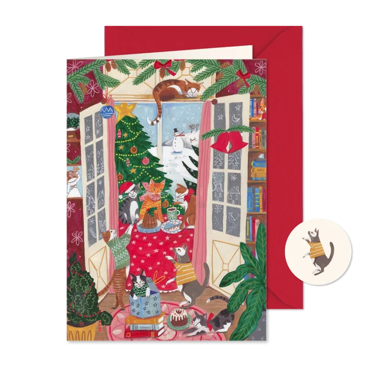  Kerstkaart katten gezellig in de woonkamer bij de kerstboom