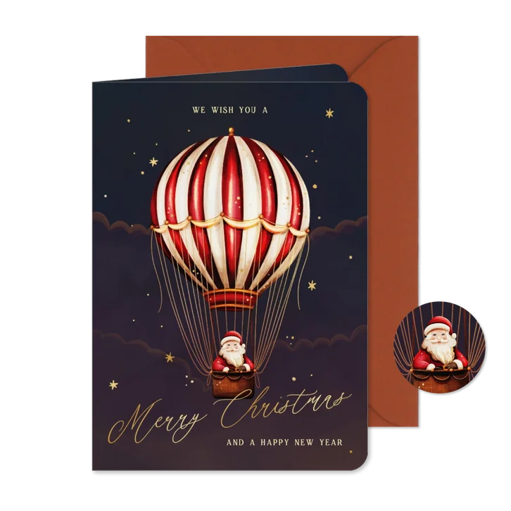 Kerstkaart kerstman in een luchtballon met sterren
