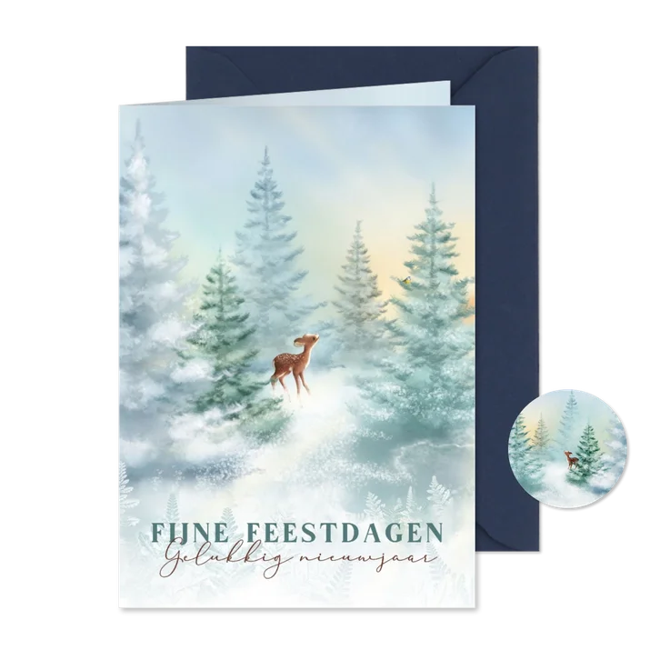 Kerstkaart met hertje in winters landschap
