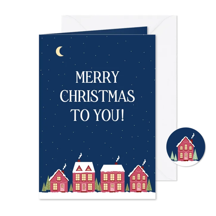 Kerstkaart met huisjes in de nacht