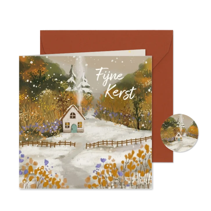Kerstkaart met knus huisje in de sneeuw