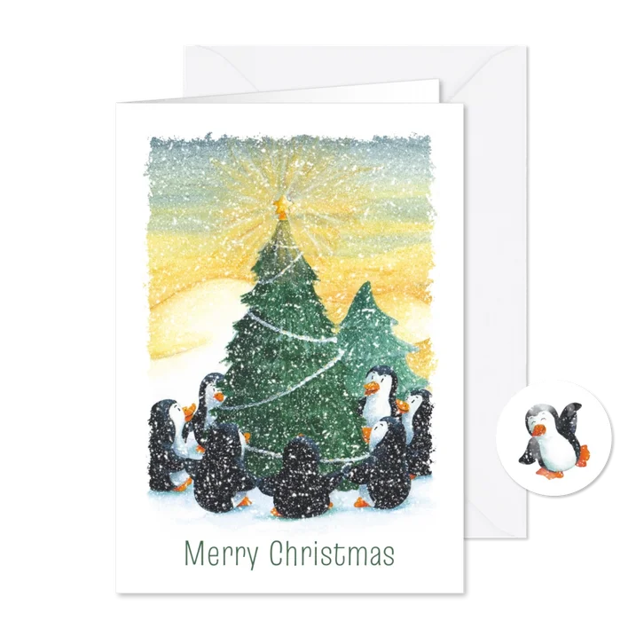 Kerstkaart met pinguïns om de kerstboom