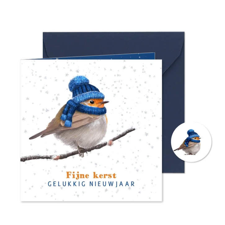 Kerstkaart met roodborst in de sneeuw