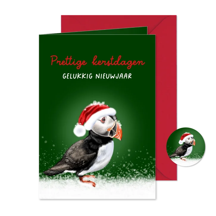 Kerstkaart papegaaiduiker in de winter