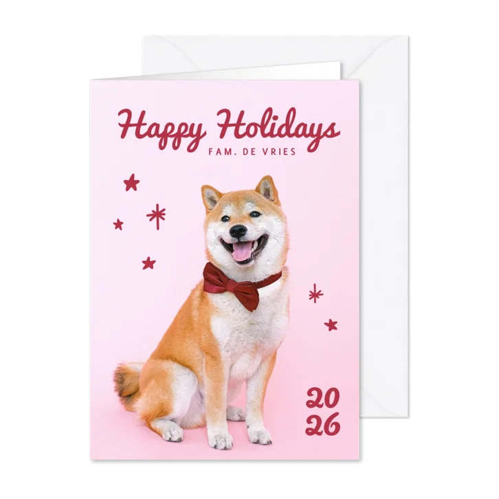 Lieve nieuwjaarskaart met hondje met strik