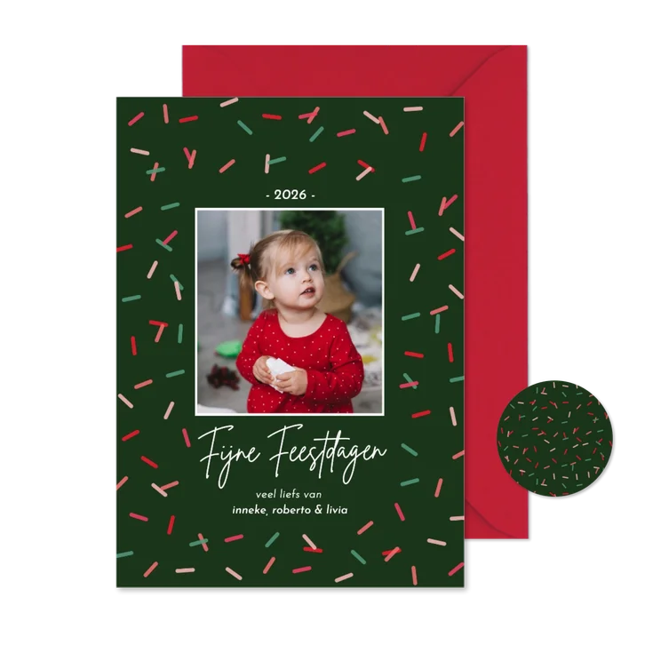 Trendy kerstkaartje groen met vrolijke sprinkles foto