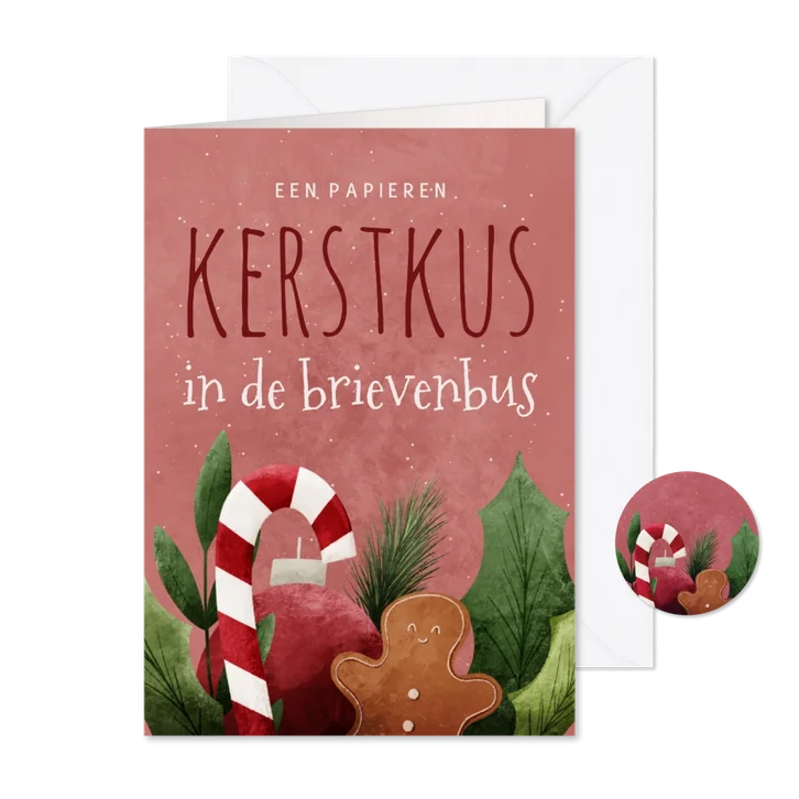 Vrolijke kerstkaart een papieren kerstkus in de brievenbus
