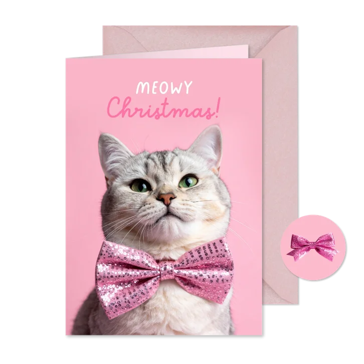 Vrolijke kerstkaart met kat en roze strik