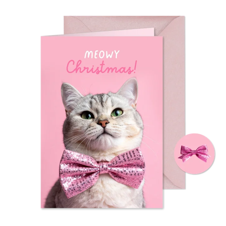 Vrolijke kerstkaart met kat en roze strik
