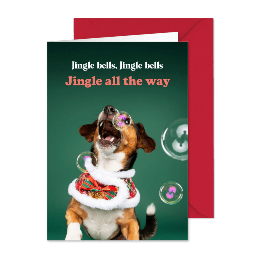 Grappige kerstkaart van hondje met jingle bellenblaas - Kaartimpressie