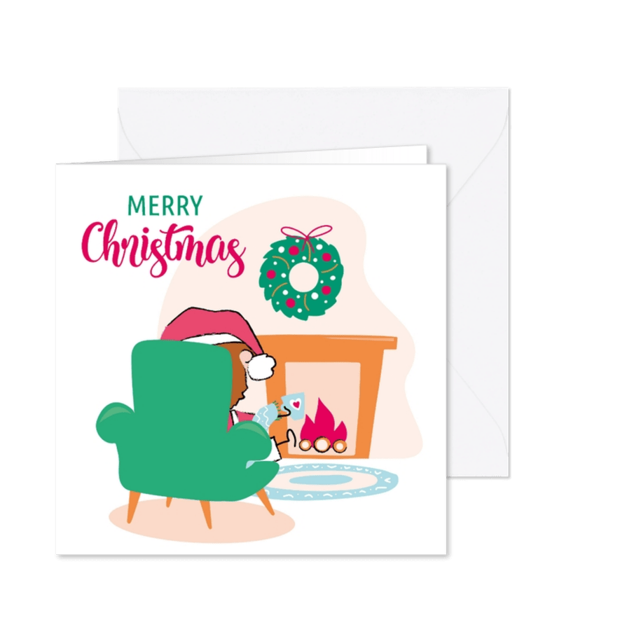 Kerstkaart bij de openhaard met een kerstmuts - Kaartimpressie