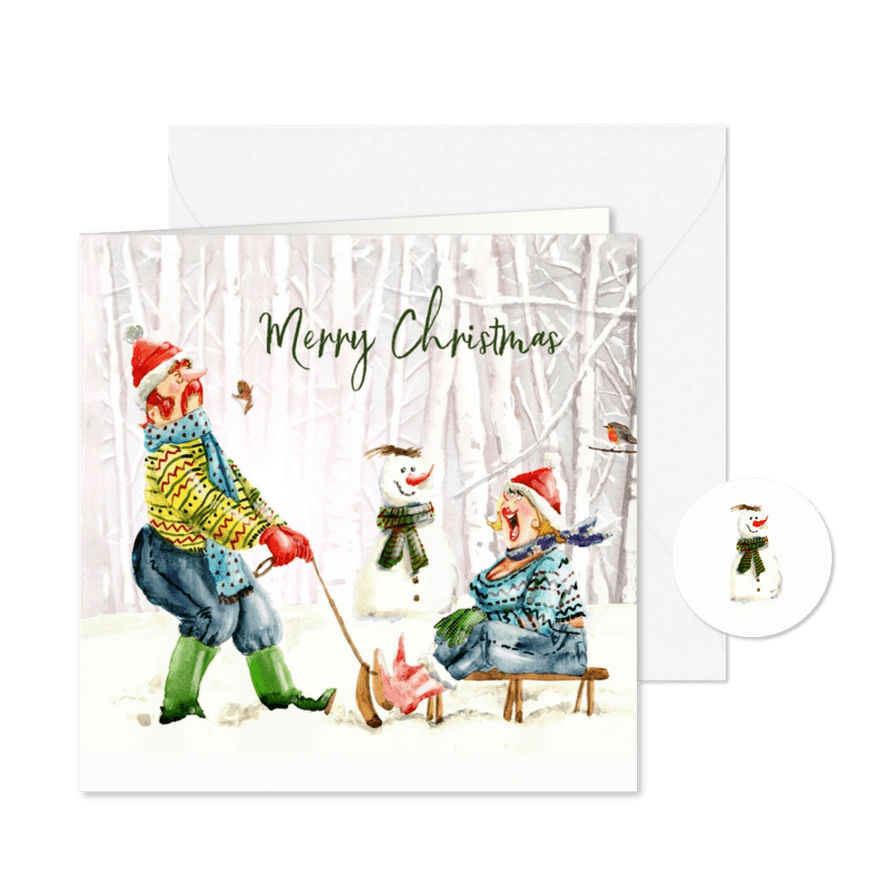 Kerstkaart man trekt vrouw op slee grappig - Kaartimpressie
