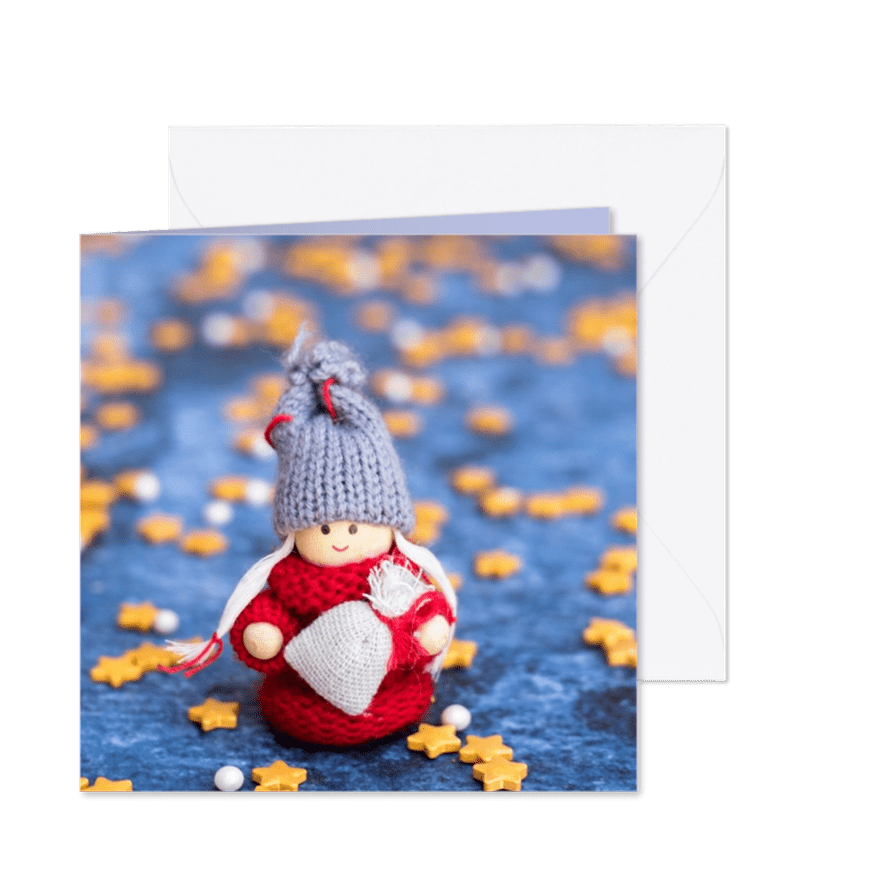 Kerstkaart met een klein elfje op een blauwe achtergrond - Kaartimpressie