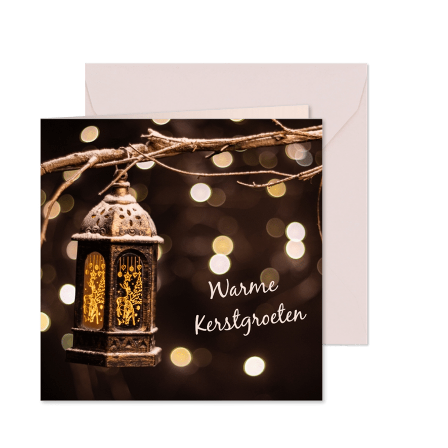 Kerstkaart met een vintage lantaarn hangend aan een boom - Kaartimpressie