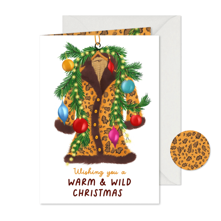 Kerstkaart met warme kerstjas en kersttakken - Kaartimpressie