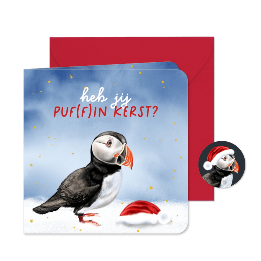 Kerstkaart papegaaiduiker met kerstmuts in de sneeuw - Kaartimpressie