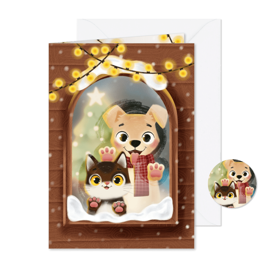 Lieve kerstkaart hond en kat achter raam sneeuw en lampjes - Kaartimpressie