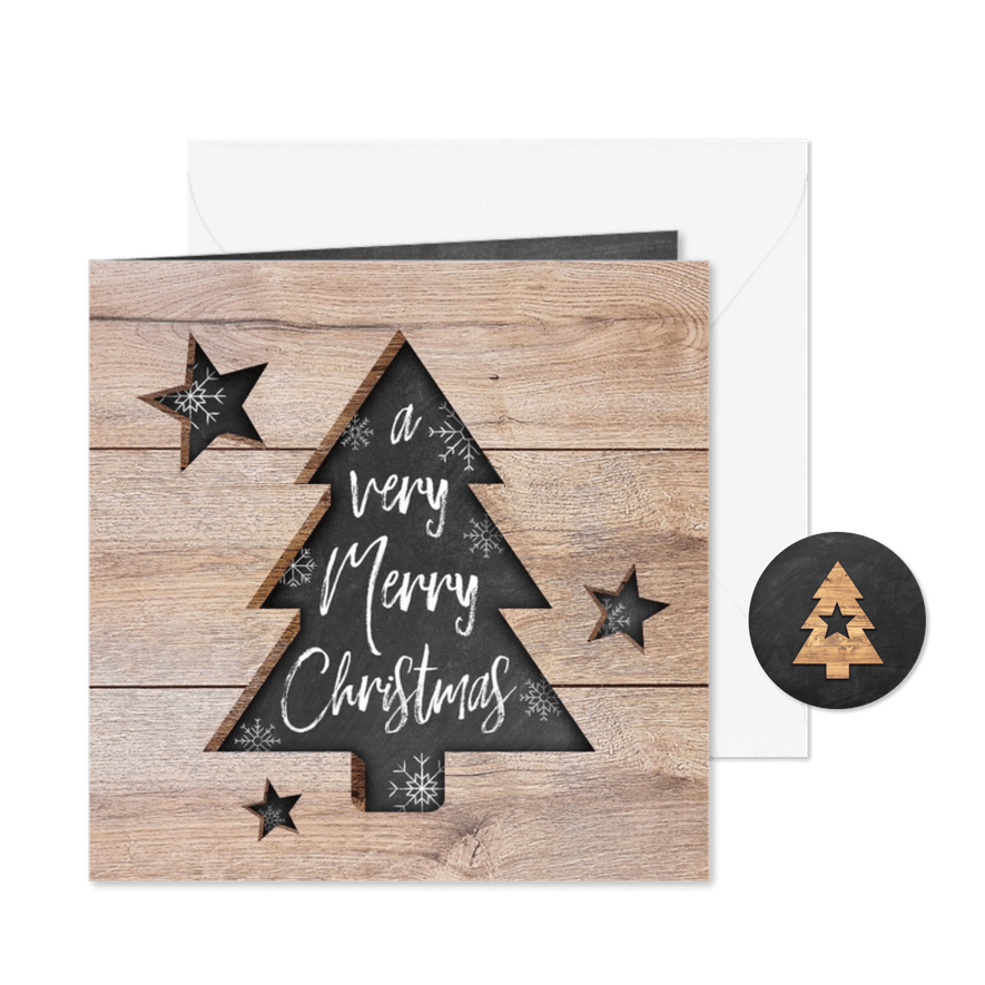 Moderne kerstkaart met hout, uitgesneden kerstboom en tekst - Kaartimpressie