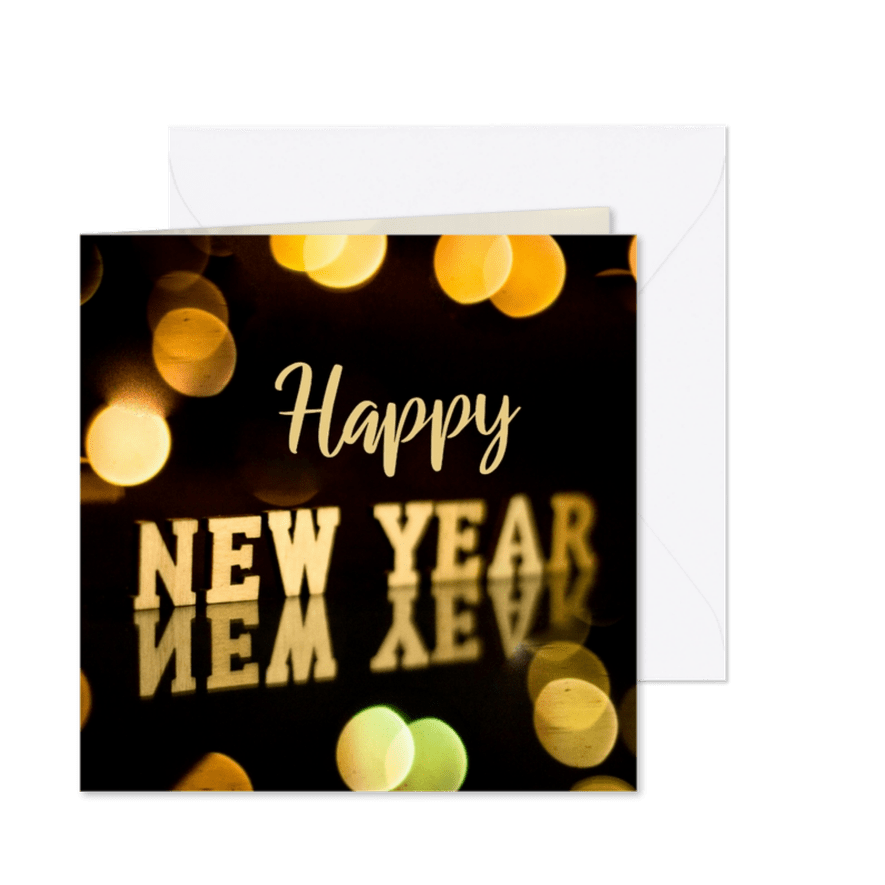 Nieuwjaarskaart met “Happy New Year” in gouden letters - Kaartimpressie
