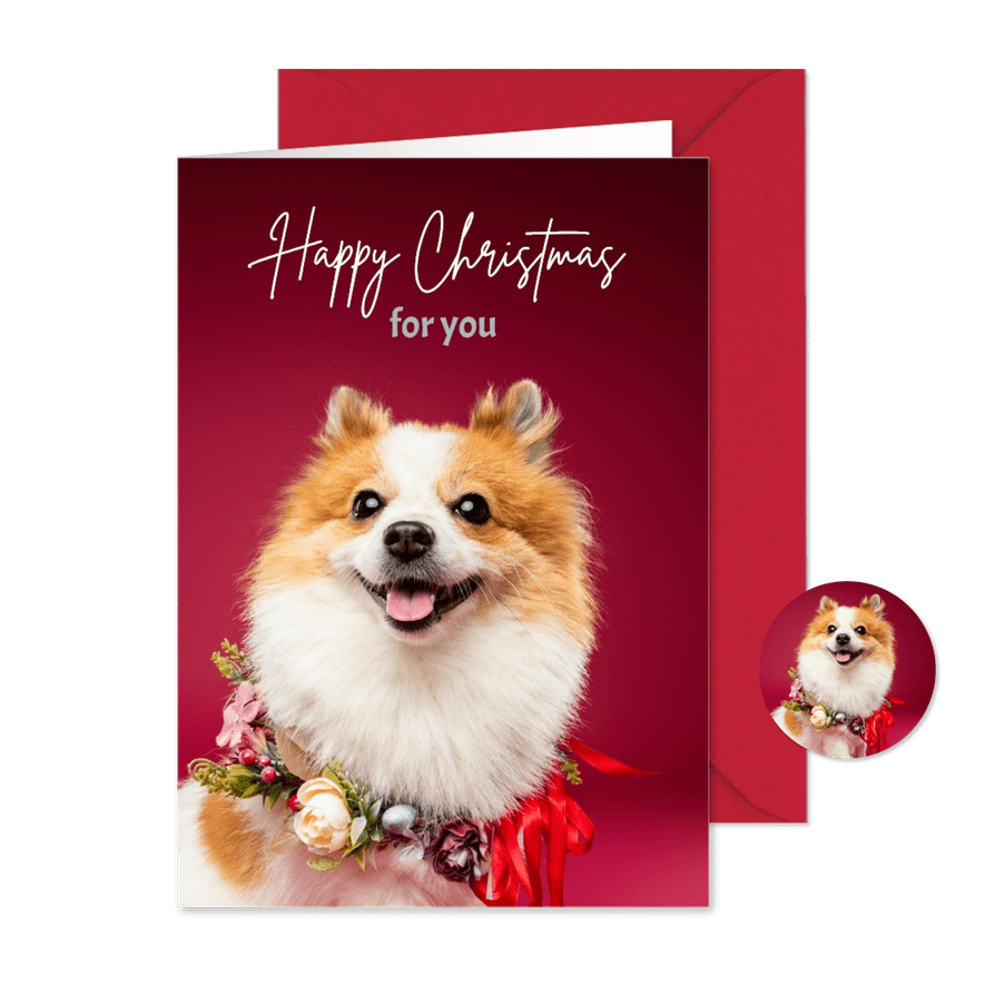 Schattig vrolijke kerstkaart pomsky met kerstkrans om - Kaartimpressie