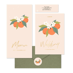 Zomerse trouwset met sinaasappels en goudfolie