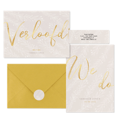 Moderne beige trouwset met takjes en goud