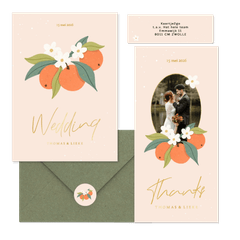 Zomerse trouwset met sinaasappels en goudfolie